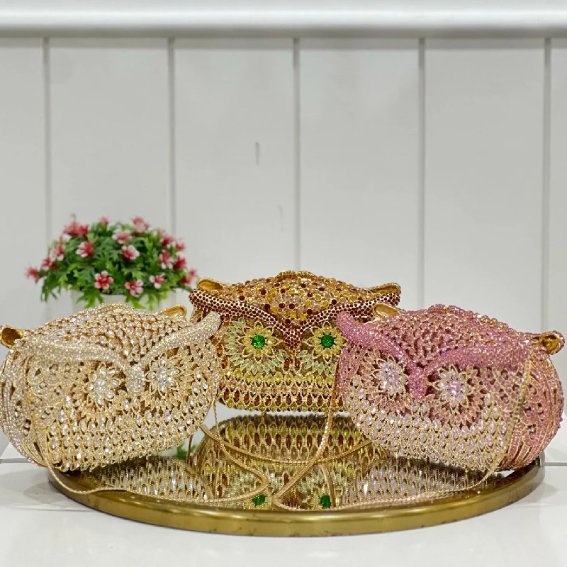 Compact Bags For Minimalist Travelers NIGHT BIRD CRYSTAL CLUTCH